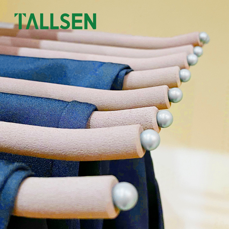 Top-mounted trouser rack with soft closing