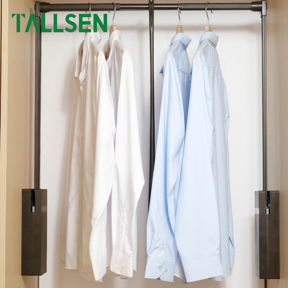Side-mounted trousers rack with soft closing